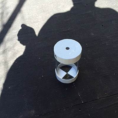 OMA sample tube standing on a flat surface